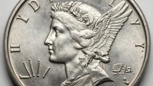 Close-up of a valuable silver Peace Dollar coin.